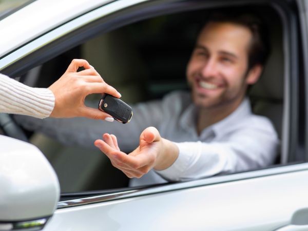 Rental car collection at Kingston Airport